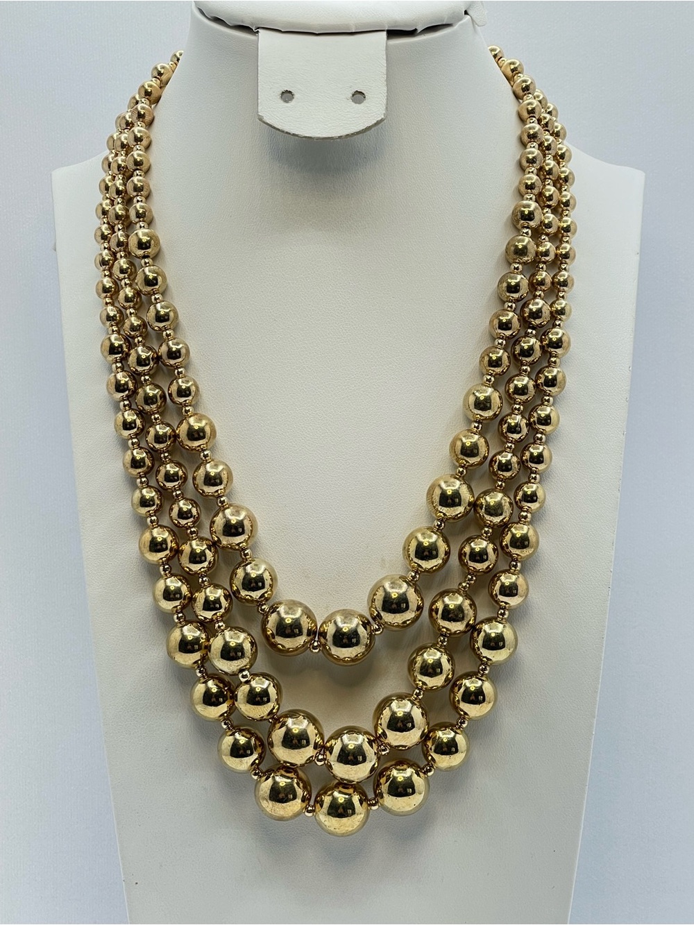 Gold Tone Multi Strand Graduated Beaded Statement Necklace